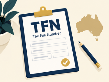 Clipboard labeled TFN (Tax File Number) form with a pencil, an outline map of Australia, and a potted plant.